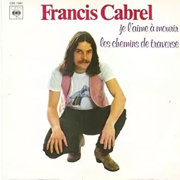 Photo entière Francis Cabrel accroupit avec gilet rose